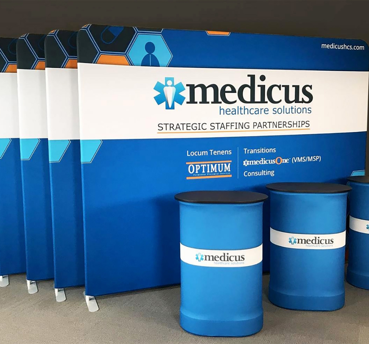 Lightweight portable pop-up display with fabric graphics