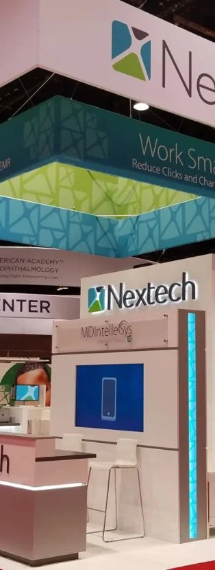Nextech medical technology trade show display with backlit graphics and LED counters