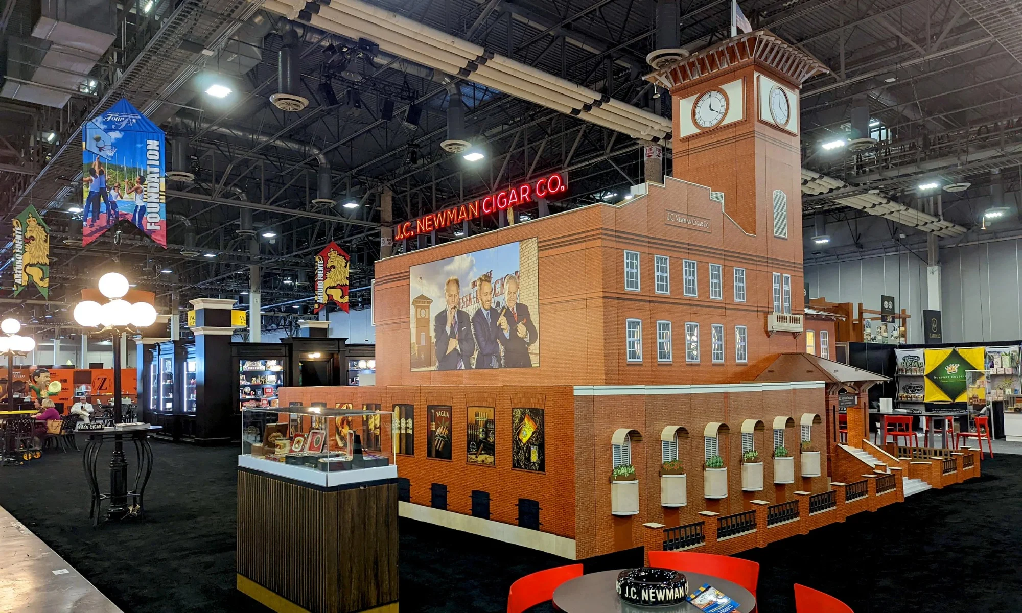 J.C. Newman Cigar Company trade show exhibit modeled after their Tampa factory with detailed architecture and branding by Suncoast Displays