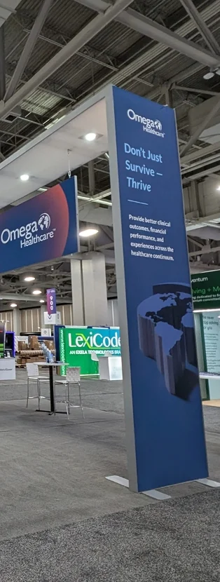 Suncoast Displays trade show exhibit in Tampa with branded signage
